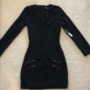 Sleek black mini long sleeve dress